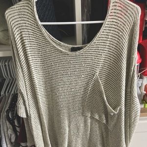 Oversized shirt with pocket, shorter in front & long in back